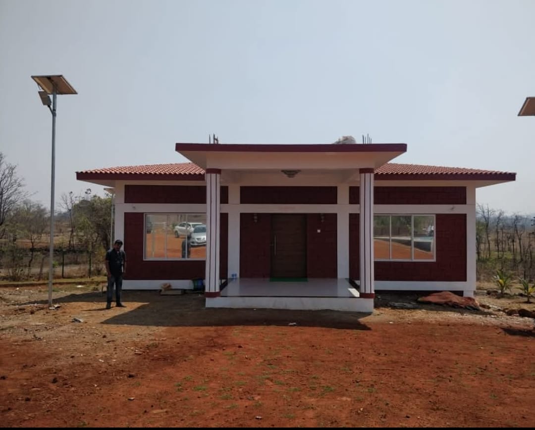 The bungalow with its pillared porch
